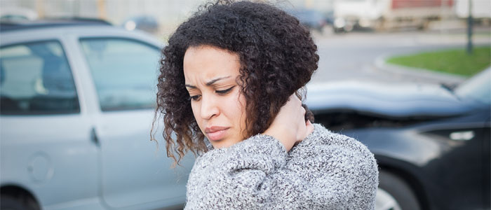 a girl with neck pain from auto injury